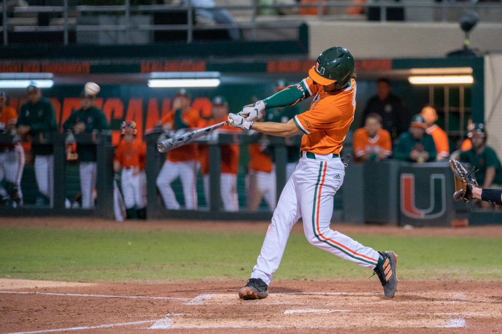 Sophomore infielder Dominic Pitelli hits a home run in the bottom of the third inning of Miami’s game versus Boston College at Mark Light Field on March. 12, 2022.