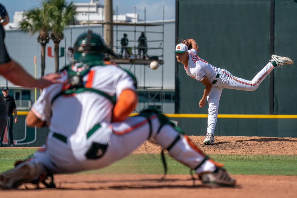 Freshman pitcher Rafe Schlesinger pitches at the top of the eighth inning of Miami’s game versus the University of Virginia at Mark Light Field on April 10, 2022.