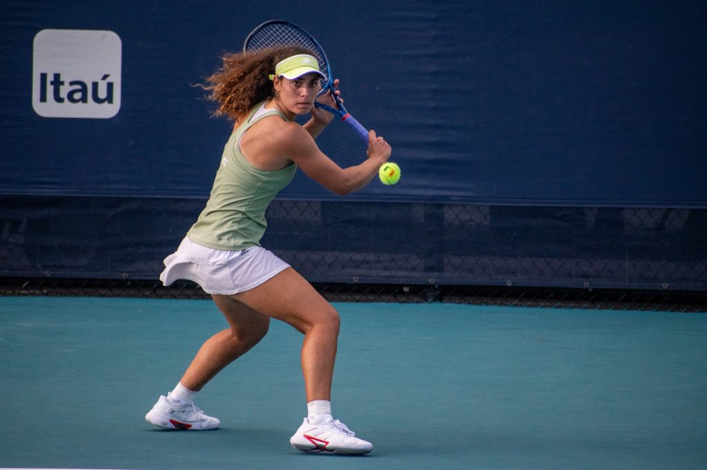 Third-year sophomore Maya Tahan prepares to rally a ball against Columbia singles opponent Melissa Sakar at the Miami Open on Friday, April 1, 2022.