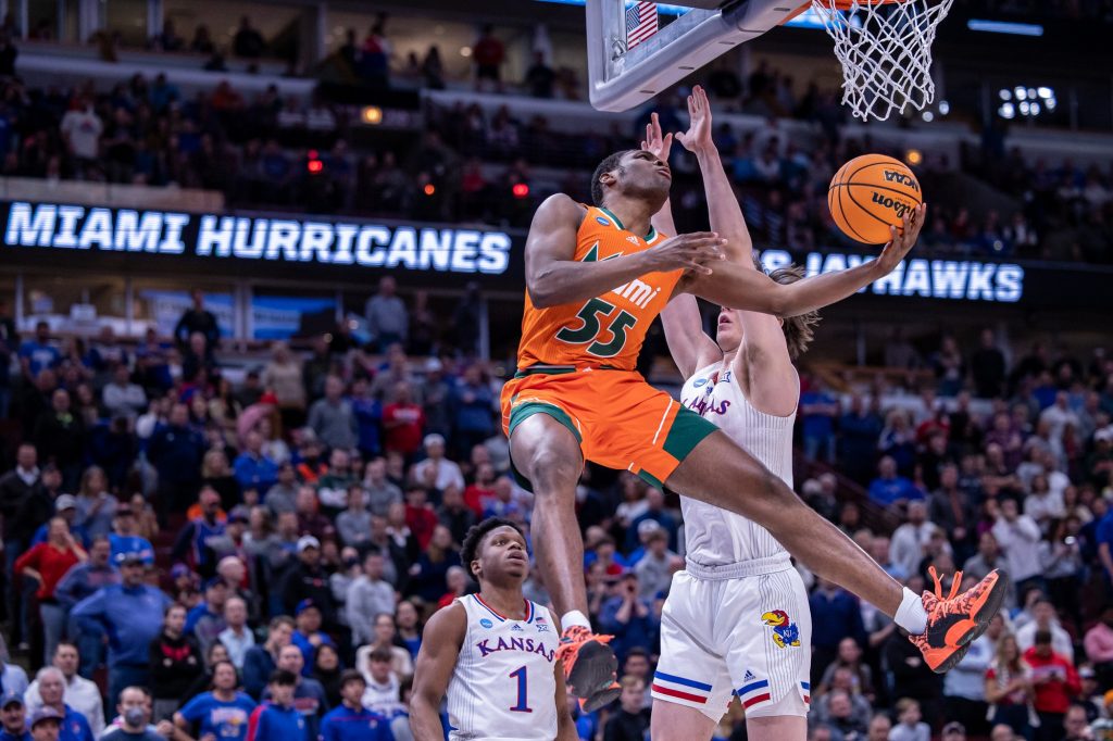 Freshman guard Wooga Poplar attempts a driving layup in Miami's 76-50 loss to top-seeded Kansas in the Elite Eight on Sunday, March 27, 2022 at the United Center in Chicago.