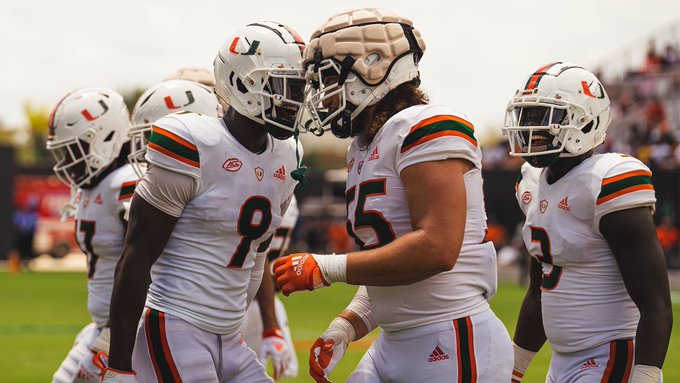 Sixth-year defensive lineman Jacob Lichtenstein celebrates with fourth-year linebacker Avery Huff during Miami's Spring Game DRV PNK Stadium on April 16, 2022.