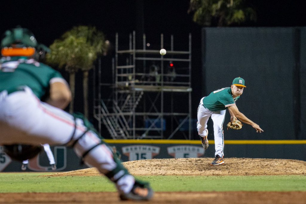 Freshman starting pitcher Karson Ligon pitches in No. 5 Miami's 17-2 win over Pittsburgh at Mark Light Field on April 23, 2022.
