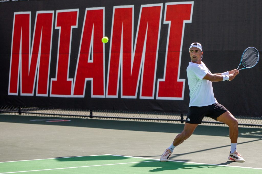 Fourth-year junior Juan Martin Jalif shot a backhand during doubles matches against Georgia State on Feb 18. at the Neil Schiff Tennis Center in Coral Gables.