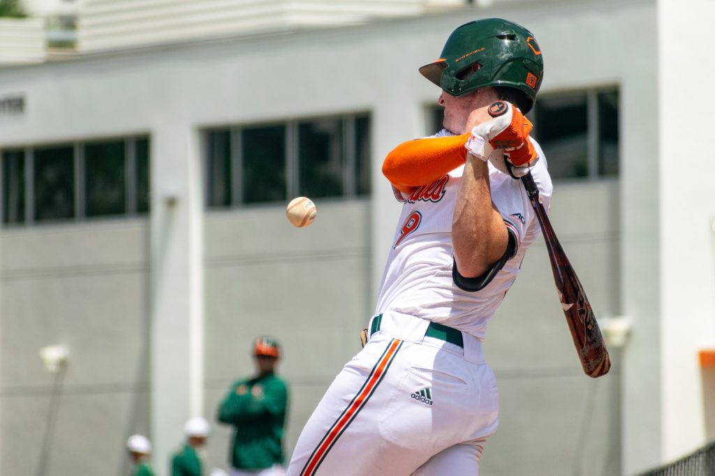 Freshman outfielder Zach Levenson hits a ball during the fifth inning of Miami's game against Pitt on Sunday April 24, 2022 at Mark Light Field.