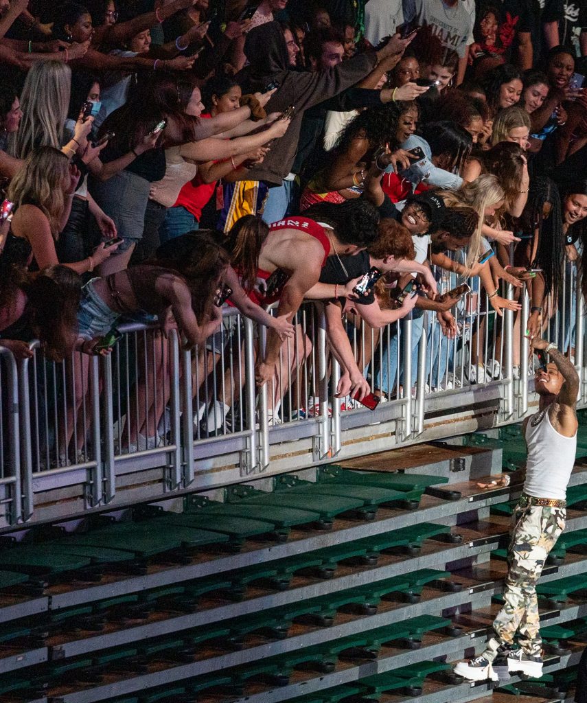 Rapper Swae Lee of Rae Sremmurd scales the tucked away seating and performs at the Spring 2022 Hurricane Productions Concert in the Watsco Center on April 1, 2022.