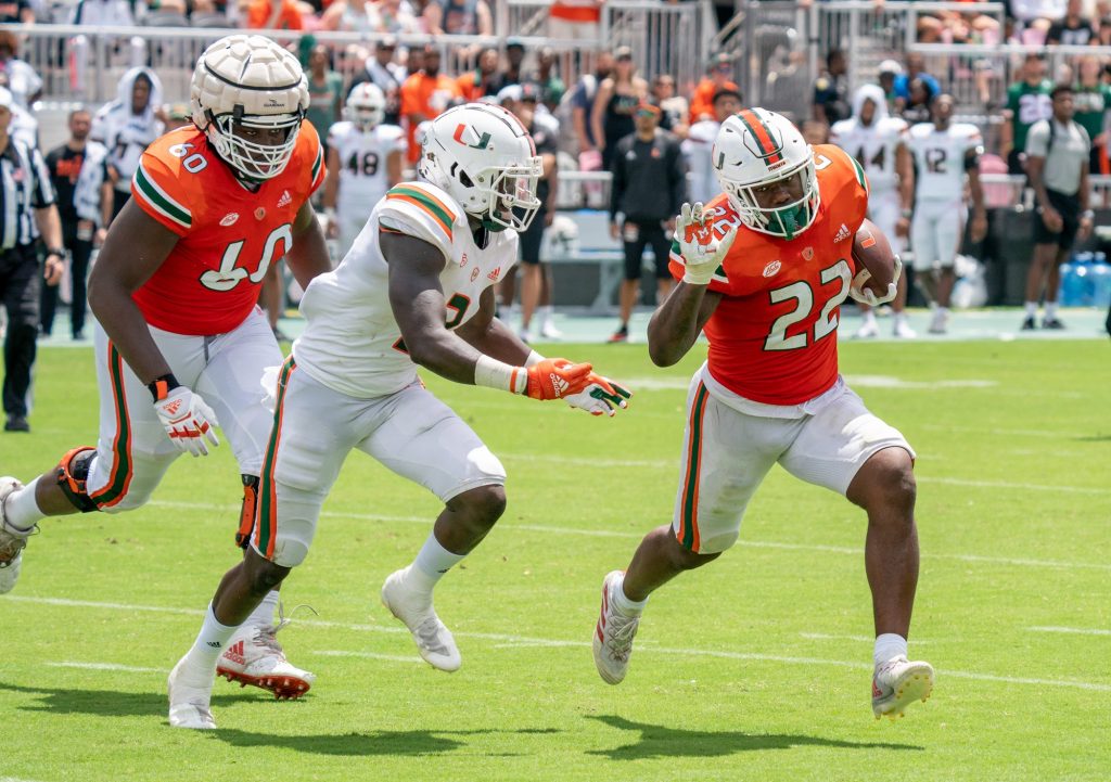 Sophomore running back Thaddius Franklyn, Jr. rushes with the ball during Miami's Spring Game at DRV PNK Stadium on April 16, 2022.