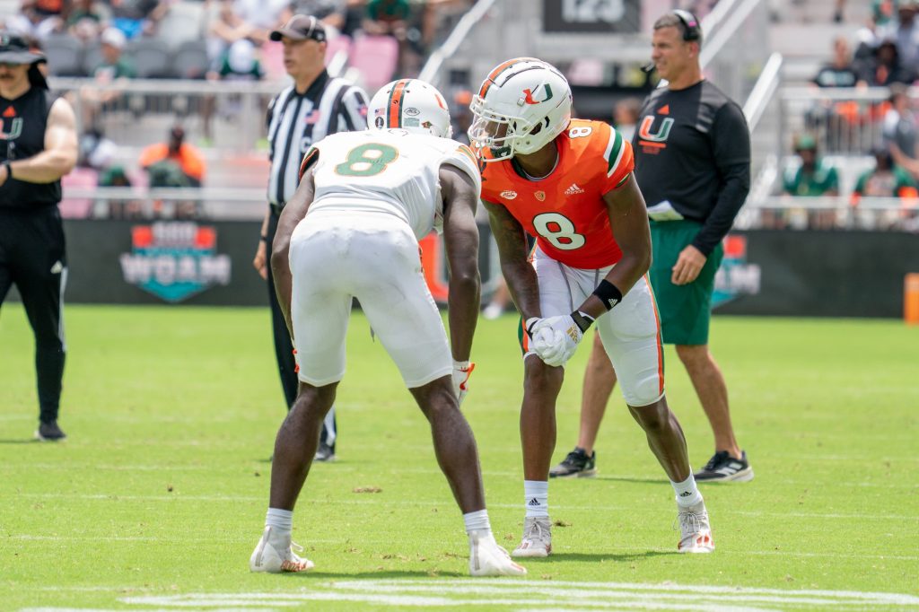 Fifth-year senior cornerback DJ Ivey lines up across from fourth-year junior wide receiver Frank Ladson, Jr. during Miami's Spring Game at DRV PNK Stadium on April 16, 2022.
