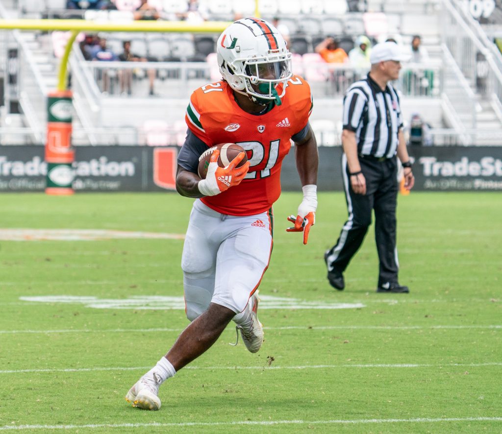 Third-year sophomore running back Henry Parrish, Jr. runs with the ball during Miami's Spring Game at DRV PNK Stadium on April 16, 2022.