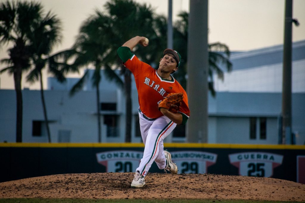 Sophomore right-handed pitcher Alejandro Torres throws high in the fifth inning during Miami's game against Stetson University at Mark Light Field on April 26, 2022.
