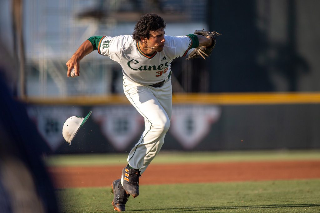 Sophomore Yohandy Morales makes a tricky play during the first inning of Miami's 17-1 win over FIU on Wednesday, April 6, 2022 at Mark Light Field.