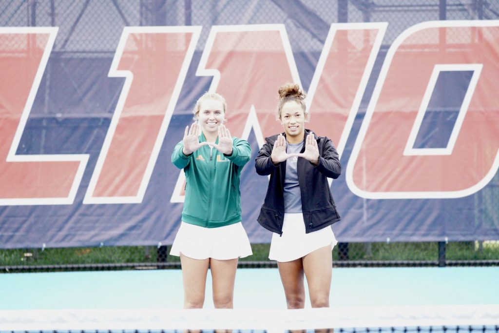 Fifth-year senior Eden Richardson and fourth-year junior Daevenia Achong hold up the "U" after a straight-set victory over Oklahoma State to reach the NCAA title game on Friday evening.