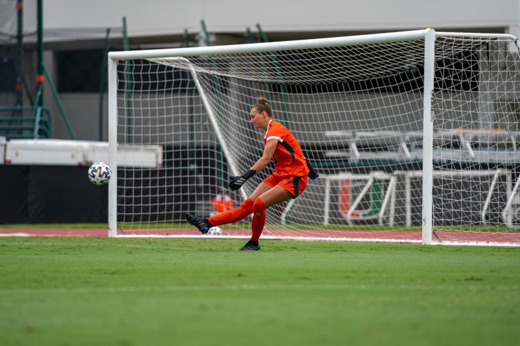 Junior goalkeeper Melissa Dagenais does a goal kick during the first half of the Canes’ match versus USF at Cobb Stadium on Sept. 12, 2021.