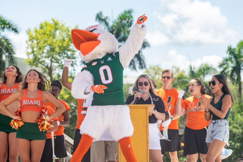 Sebastian the Ibis teaches the crowd how to do the 'Canes spellout ahead of Miami's first home game on Sept. 3.