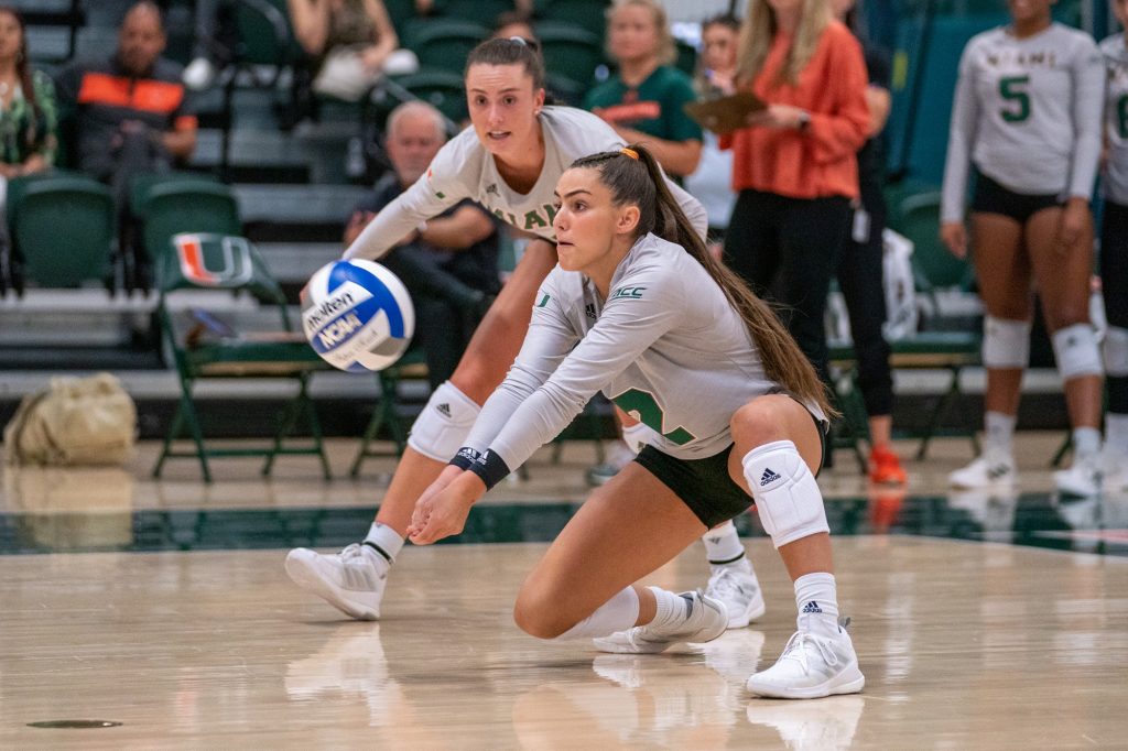 Freshman liber Naylani Feliciano bumps the ball during the first set of Miami’s match versus the University of South Carolina in the Knight Sports Complex on Sept. 16, 2022.