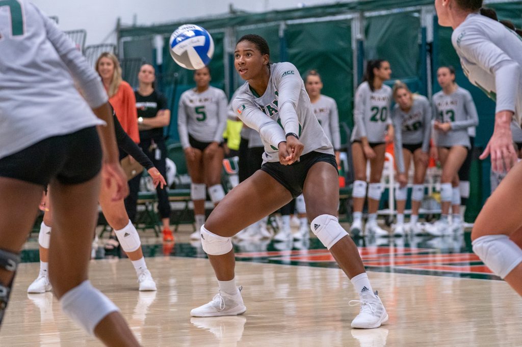 Freshman outside hitter Flormarie Heredia Colon bumps the ball during the first set of Miami’s match versus the University of South Carolina in the Knight Sports Complex on Sept. 16, 2022.