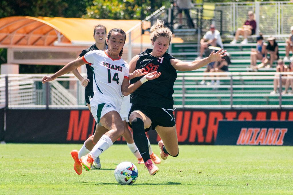 Freshman Defender Emma Pidding steals the ball from Oklahoma State during Miami's win on Sept. 3 at Cobb Stadium.