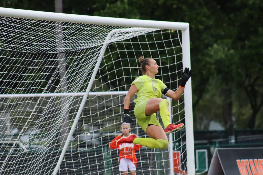 Dagenais leaps in the air during Miami's match against Florida State on October 1, 2022.