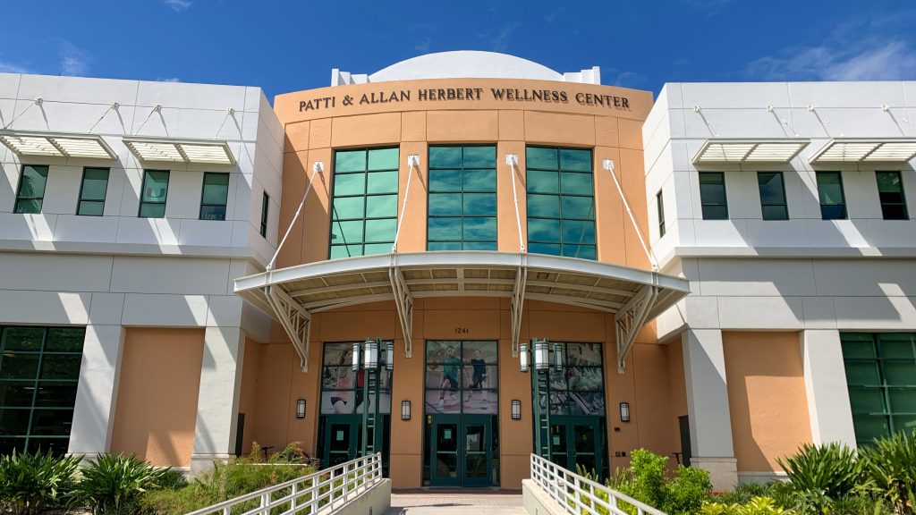 The front entrance to the Patti & Allan Herbert Wellness Center on the Coral Gables campus.