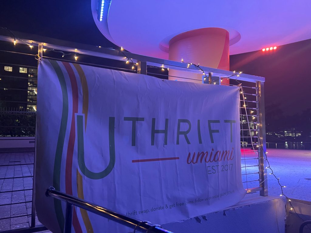 UThrift advertises its annual fashion show on the Lakeside Village Patio.