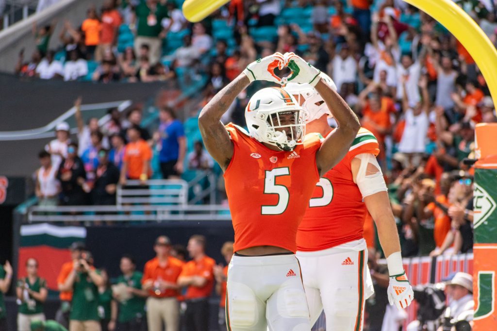 Third-year sophomore wide receiver Key'Shawn Smith holds up a heart following his touchdown against Southern Miss on Sept. 10 at Hard Rock Stadium.