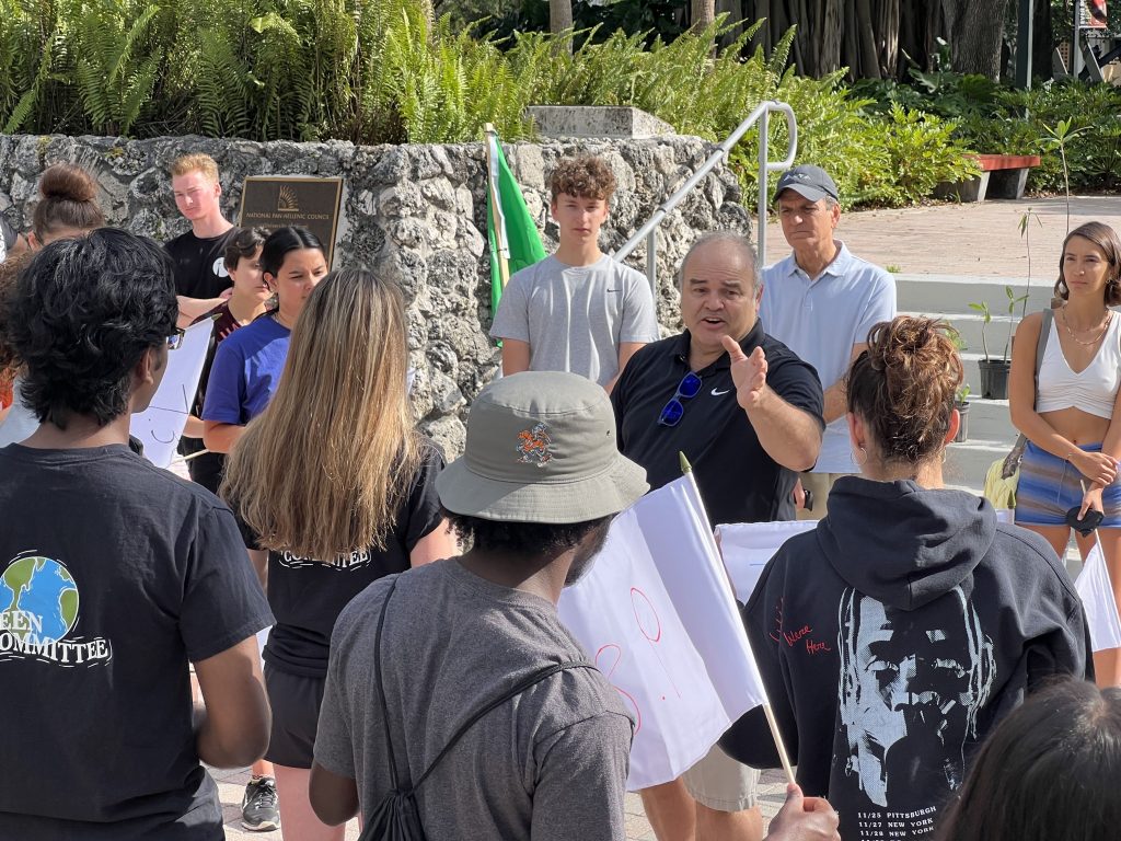 Xavier Cortada speaks to UM students at an on-campus Plan(T) event, where they later planted hundreds of mangrove trees.