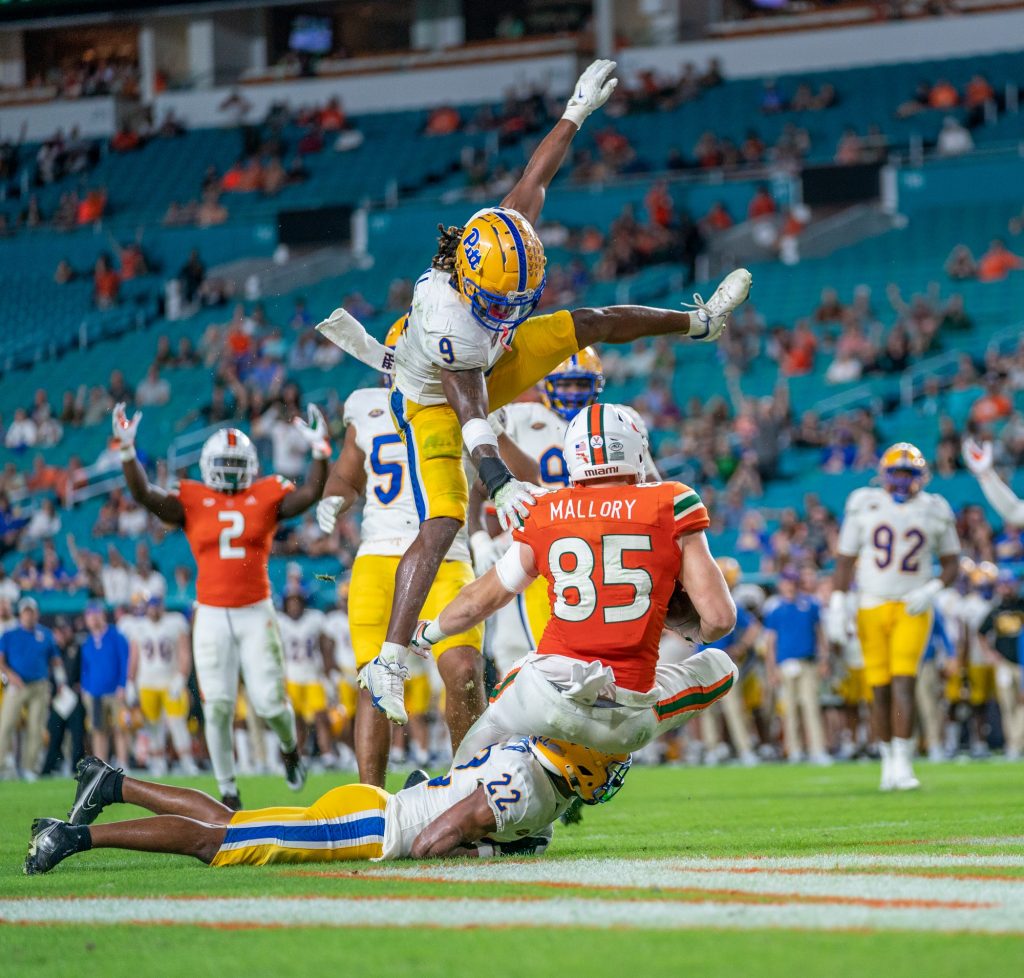 Fifth-year senior tight end Will Mallory catches a four-yard pass for a touchdown during the fourth quarter of Miami's game versus Pittsburgh at Hard Rock Stadium on Nov. 26, 2022.