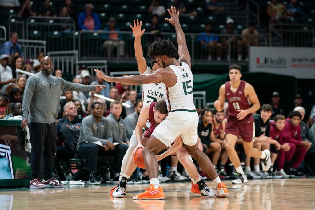 Third-year sophomores forward Norchad Omier and guard Nijel Pack lock down a Lafayette player and forces a timeout during the second half of Miami’s game versus Lafayette in the Watsco Center on Nov. 7, 2022.