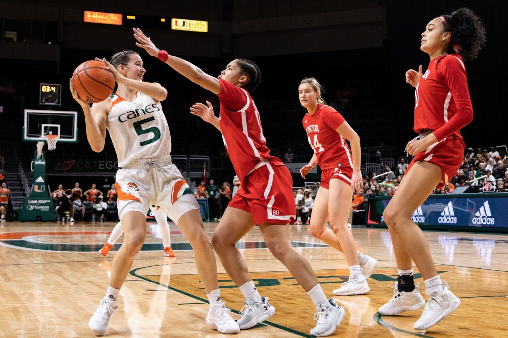 Graduate student guard Karla Erjavec holds the ball away from defenders during Miami's win over Boston University on Sunday, Nov. 13 at the Watsco Center.