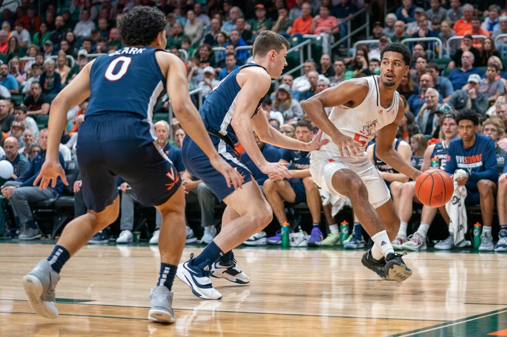 Fourth-year junior guard Harlond Beverly drives to the basket during the first half of Miami’s game versus the University of Virginia in the Watsco Center on Dec. 20, 2022.