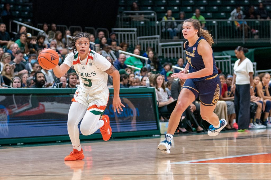 Graduate student forward Destiny Harden brings the ball down court on a fast break during the third quarter of Miami’s game versus Notre Dame in the Watsco Center on Dec. 29, 2022.