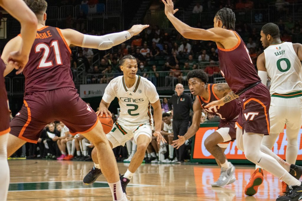 Guard Isaiah Wong protects the ball as he approaches Viriginia Tech's zone defense on January 31 at the Watsco Center.
