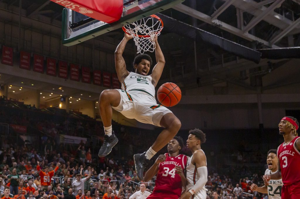 Fourth-year junior guard Harold Beverly dunks on Louisville in the second half of Miami’s game against the Cardinals in the Watsco Center on Saturday, Feb. 11.