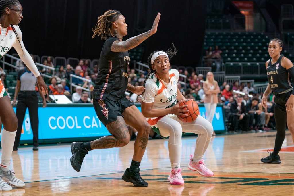 Sophomore guard Jasmyne Roberts drives to the basket during the third quarter of Miami’s game versus Florida State in the Watsco Center on Feb. 9, 2023.