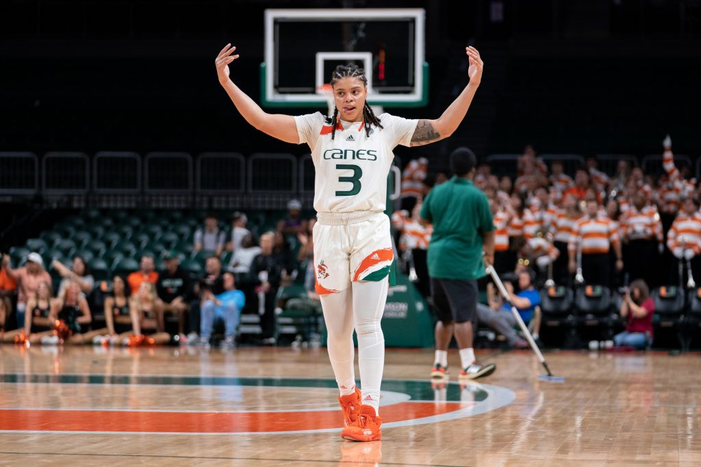 Graduate student forward Destiny Harden hypes up the crowd during the fourth quarter of Miami’s game versus Florida State in the Watsco Center on Feb. 9, 2023.