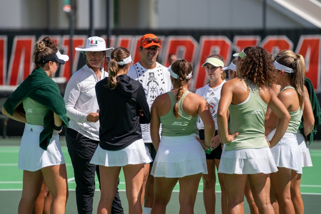 Head coach Paige Yaroshuk-Tews speaks to her team before the start of singles matches at the Neil Schiff Tennis Center on Feb. 11, 2023.