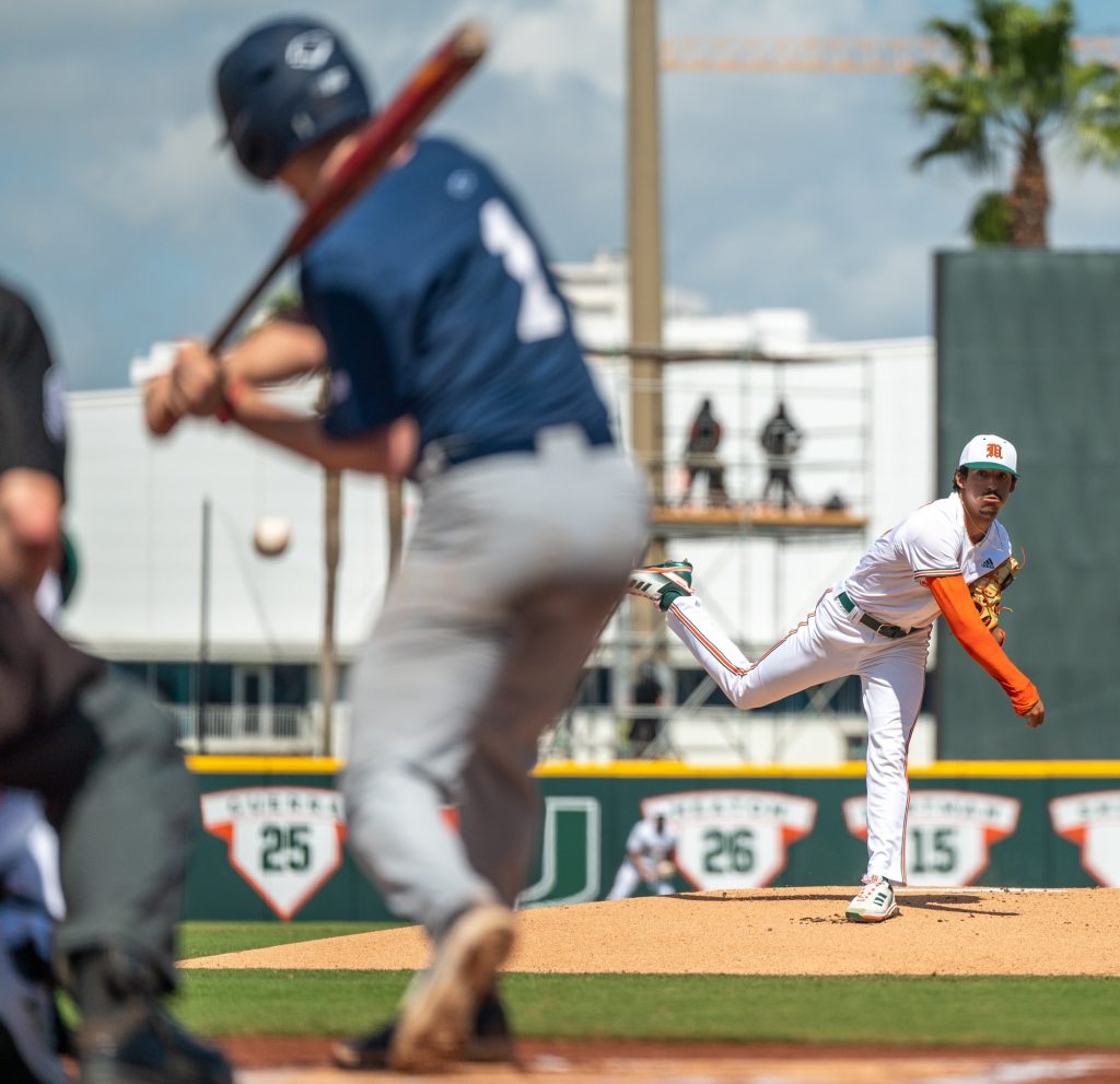 Junior right-handed pitcher Alejandro Rosario pitches during the first inning of Miami's game against Penn State University on Sunday, Feb. 19 at Mark Light Field.