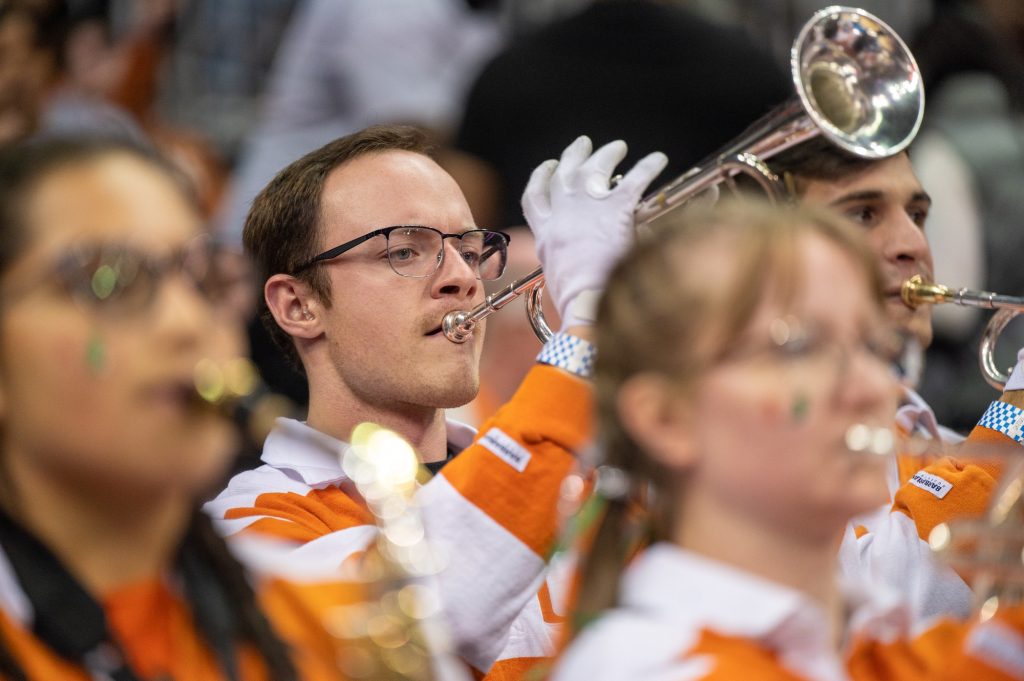The Frost Band of the Hour plays a pep song during the first half of Miami's Sweet 16 matchup against the Unviersity of Houston on Friday, March 24 at the T-Mobile Arena.
