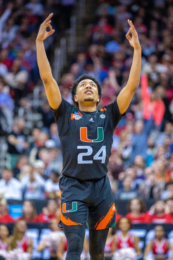 Third-year sophomore guard Nijel Pack celebrates making a three-pointer during the second half of Miami’s Sweet 16 matchup against Houston in the T-Mobile Center in Kansas City, MO on March 24, 2023.