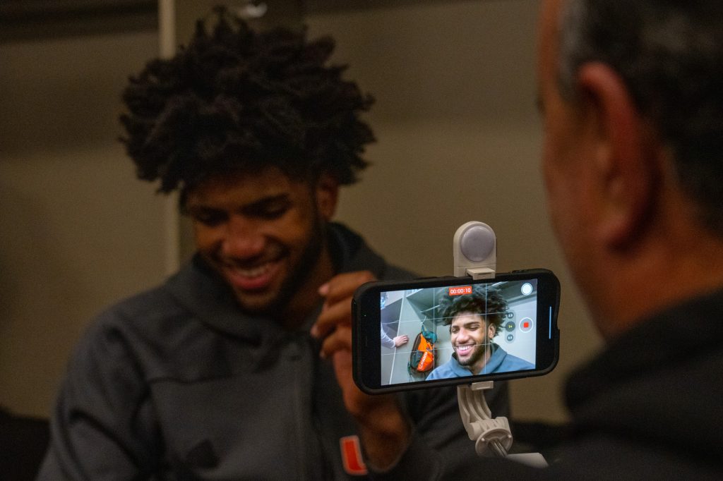 Third-year sophomore forward Norchad Omier answers a question in the locker room after Miami’s 89-75 win over the University of Houston in the T-Mobile Center in Kansas City, MO on March 24, 2023.
