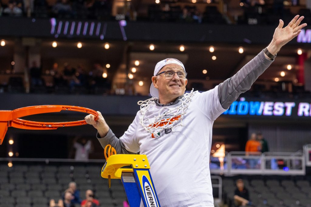 Head coach Jim Larrañaga celebrates after Miami’s 88-81 win over the University of Texas in the T-Mobile Center in Kansas City, MO on March 26, 2023.