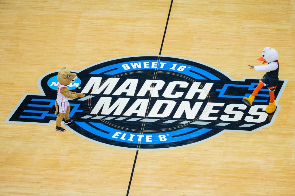 Miami and Houston mascots face off in a dance battle during a timeout in the first half of Miami's win over the University of Houston on Friday, March 24 at the T-mobile Arena.