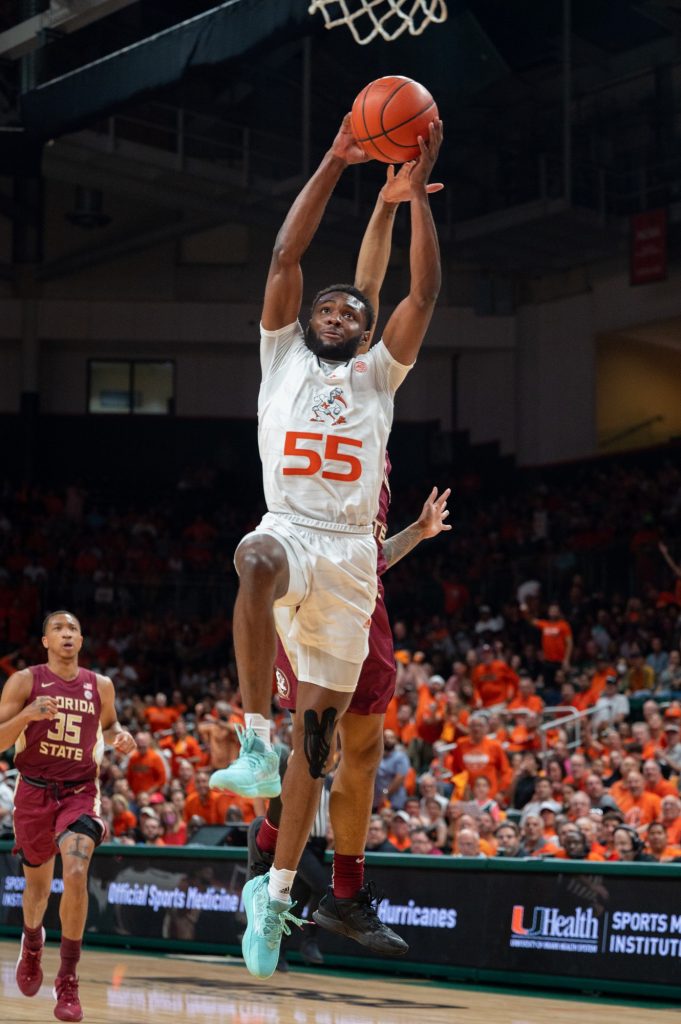 Sophomore guard Wooga Poplar goes up for a dunk during Miami's game versus Florida State University on Saturday, Feb. 25 at the Watsco Center.