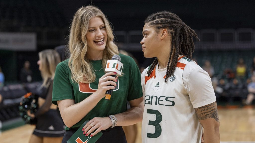 Graduate Student Destiny Harden talks to Cameron Dobbs after her final game as a Miami Hurricane. The ‘Canes beat Virginia during their senior day game at the Watsco Center on Sunday, Feb. 26.