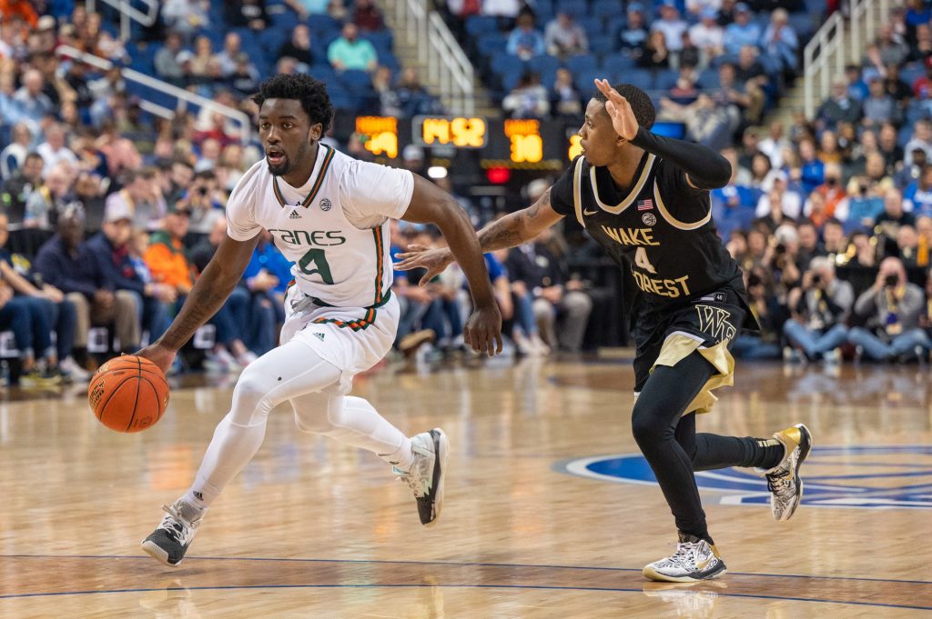 Sophomore guard Bensley Joseph dribbles down the court during Miami's semifinal game of the ACC tournament against Duke University on Friday, March 10 at the Greensboro Coliseum Complex.