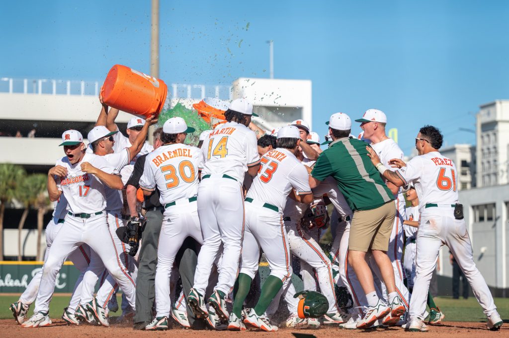 The 'Canes celebrate their series win over Penn State University on Sunday, Feb. 19 at Mark Light Field.