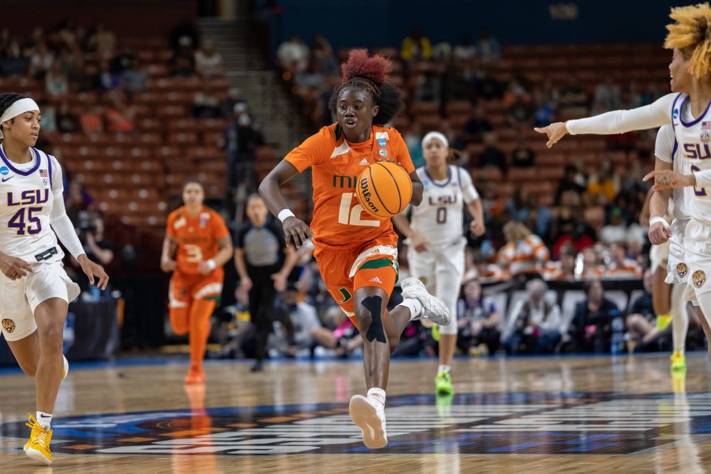 Sophomore guard Ja’Leah Williams drives the ball down the court in a desperate attempt to even the score in the fourth quarter of Miami’s Elite Eight game against the LSU Lady Tigers on Sunday, March 26 in the Bon Secours Arena.