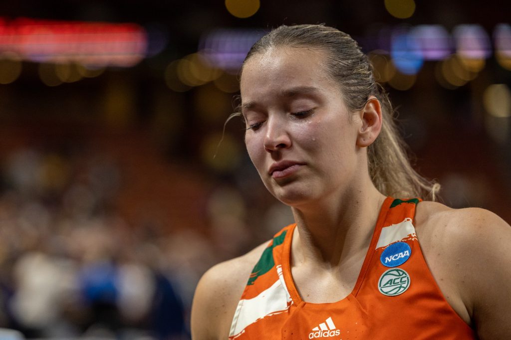 Graduate student guard Karla Erjavec sheds a tear as she walks off the court after falling to LSU in Miami’s first ever Elite Eight matchup in the Bon Secours Arena on Sunday, March 26