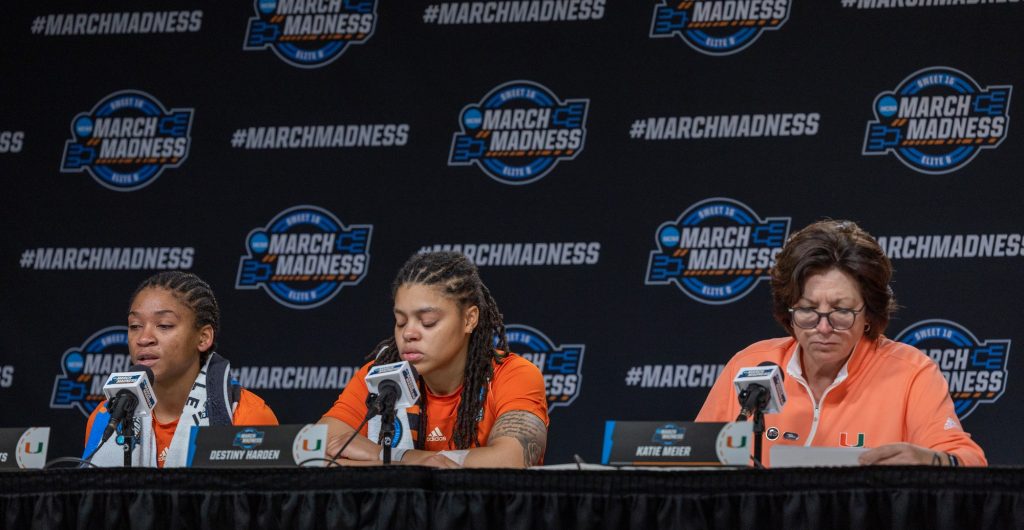 Miami’s Katie Meier, Destiny Harden and Jasmyne Roberts answer questions for the press following the 'Canes loss to the Lady Tigers in Miami’s first ever Elite Eight matchup in the Bon Secours Arena on Sunday, March 26.
