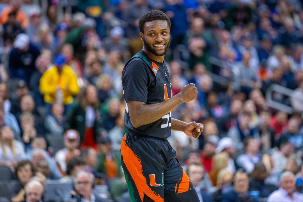 Sophomore guard Wooga Poplar celebrates during the second half of Miami’s Sweet 16 matchup against Houston in the T-Mobile Center in Kansas City, MO on March 24, 2023.