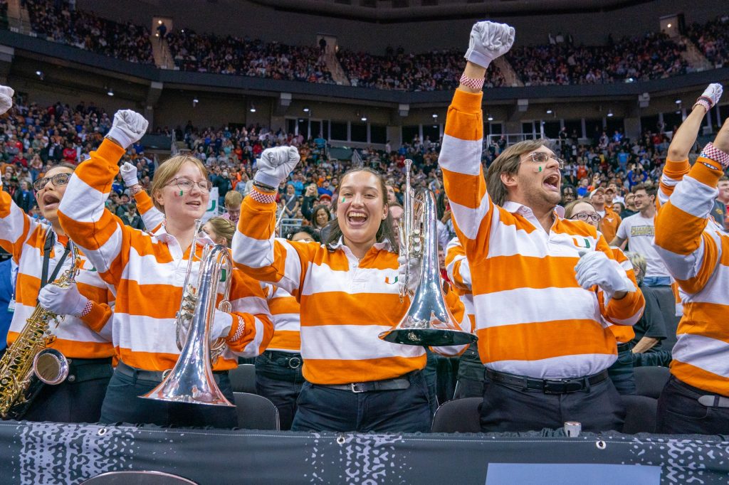 The Frost Band of the Hour celebrates during the second half of Miami’s Elite Eight matchup against the University of Texas in the T-Mobile Center in Kansas City, MO on March 26, 2023.